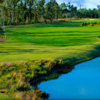 A view of the 4th green surrounded with water on the right side at The Preserve Golf Club