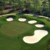 Aerial view of a green surrounded by bunkers on the Burnt Pine Course at Sandestin Golf and Beach Resort