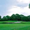 Green surrounded by water and bunkers at Hombre Golf Club - Good/Ugly Course